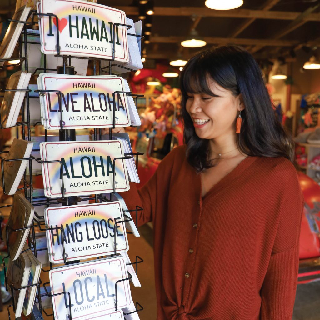 Tourist looking at Aloha Plates