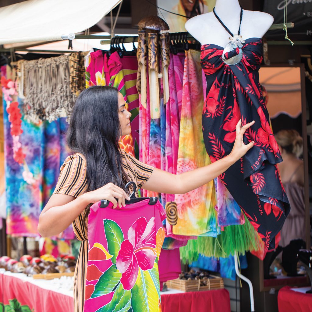 Tourist looking at dresses