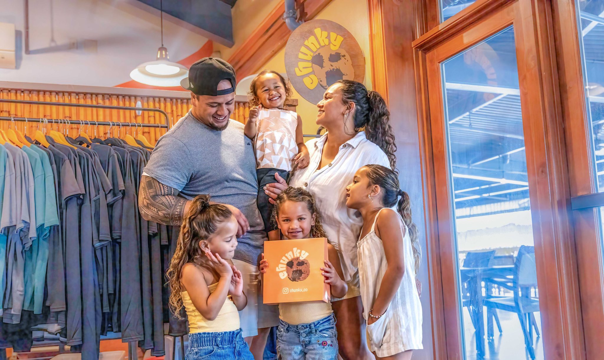 Family visiting chunky cookie Shop